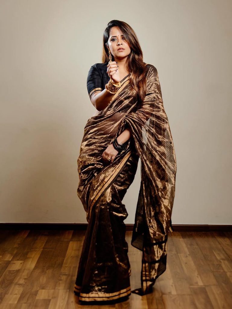 Modern textile design blends multiple colors seamlessly in Anasuya's traditional format