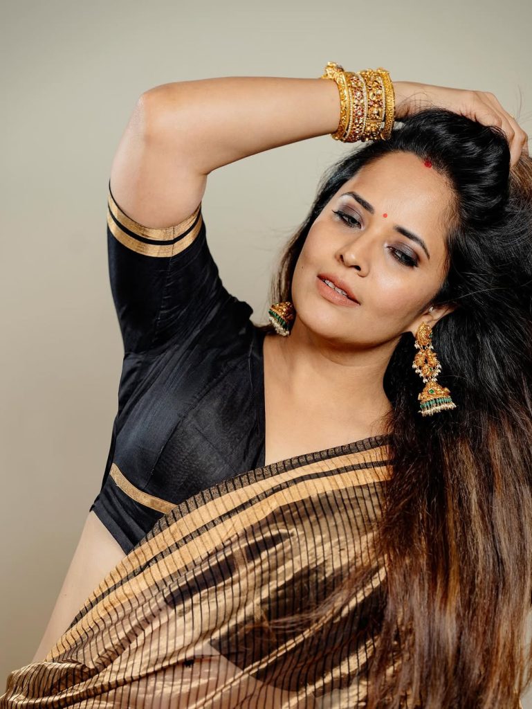 Contemporary saree styling showcases Anasuya's fashion innovation in cultural clothing