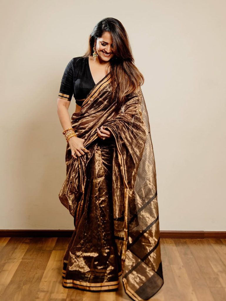 Modern textile design blends multiple colors seamlessly in Anasuya's traditional format