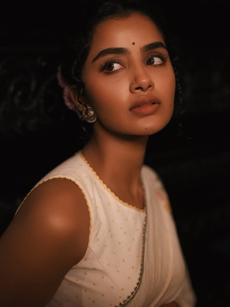 Angelic white traditional styling creates heavenly portrait effect for Anupama Parameswaran