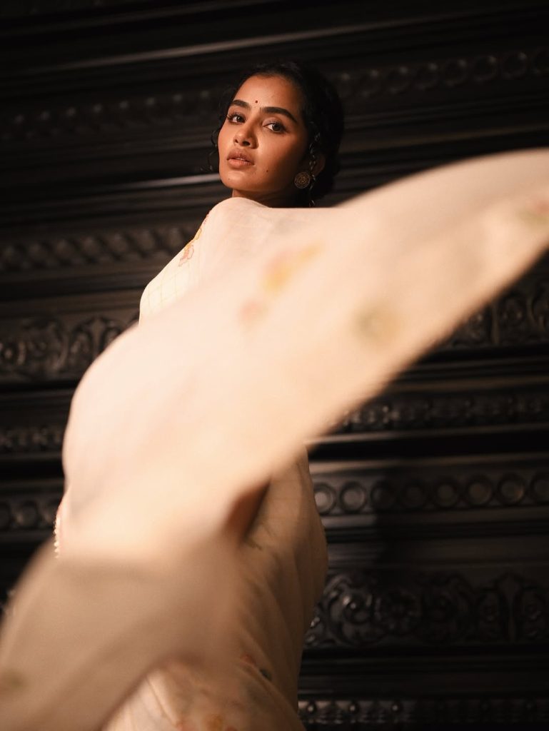 Angelic white traditional styling creates heavenly portrait effect for Anupama Parameswaran