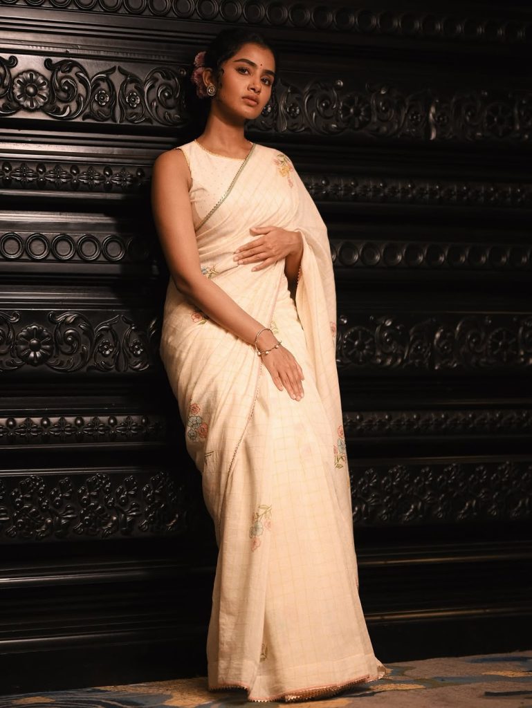 Angelic white traditional styling creates heavenly portrait effect for Anupama Parameswaran