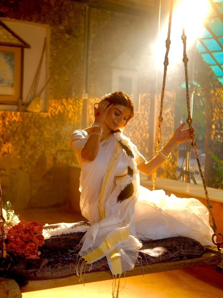 Classic white saree draping highlights Anveshi Jain's natural grace