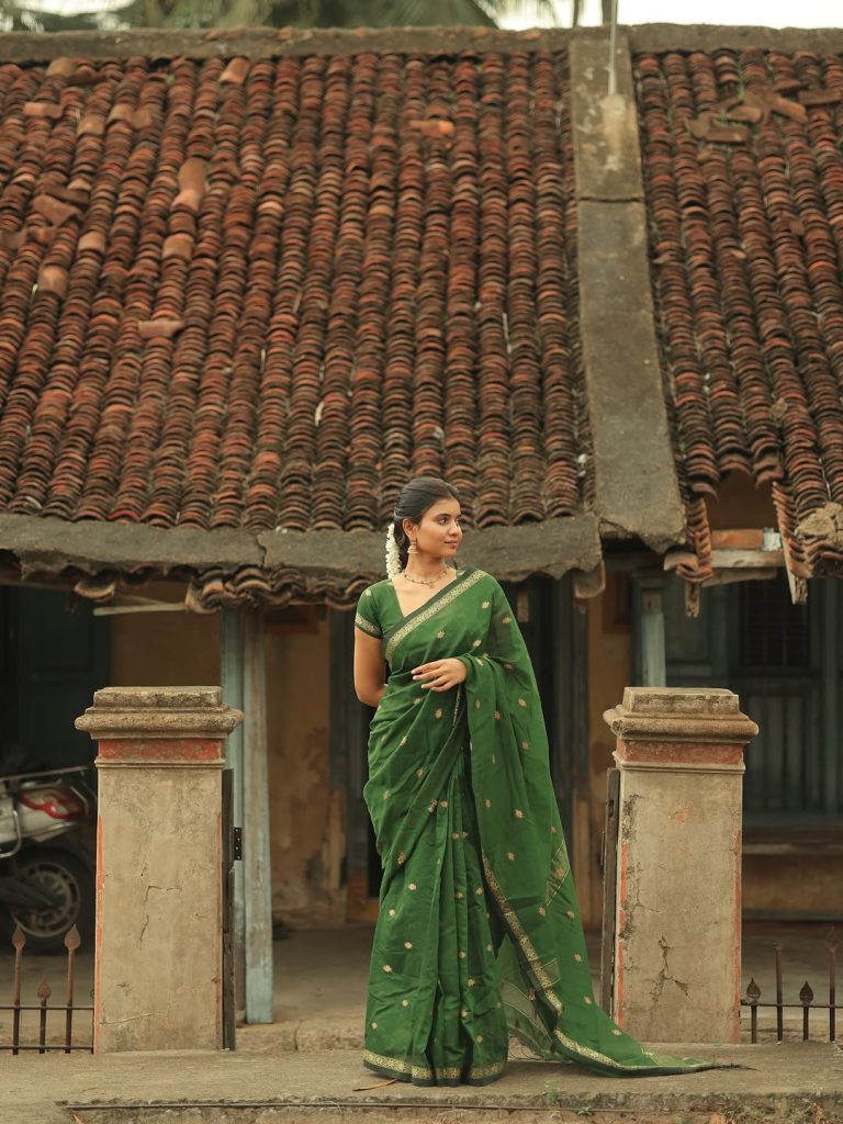 Earth-toned green fabric complements Arul Jyothi's natural photography lighting