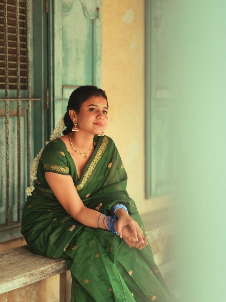 Natural green saree reflects Arul Jyothi's connection to environmental consciousness