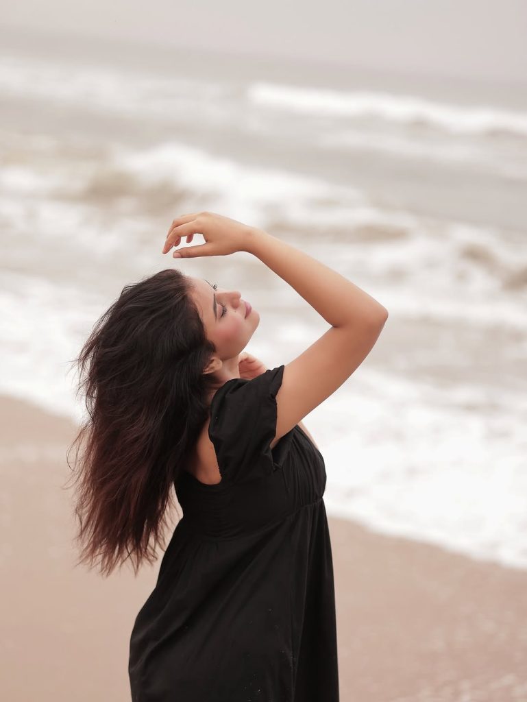 Beach photography captures Arul Jyothi's sophisticated coastal fashion sense