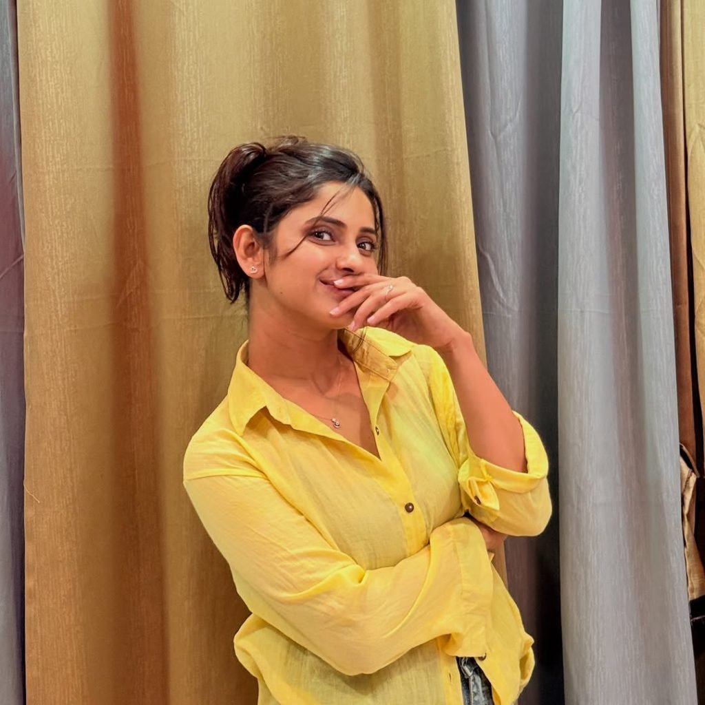 Casual denim styling creates relaxed, approachable fashion statement for Aysha