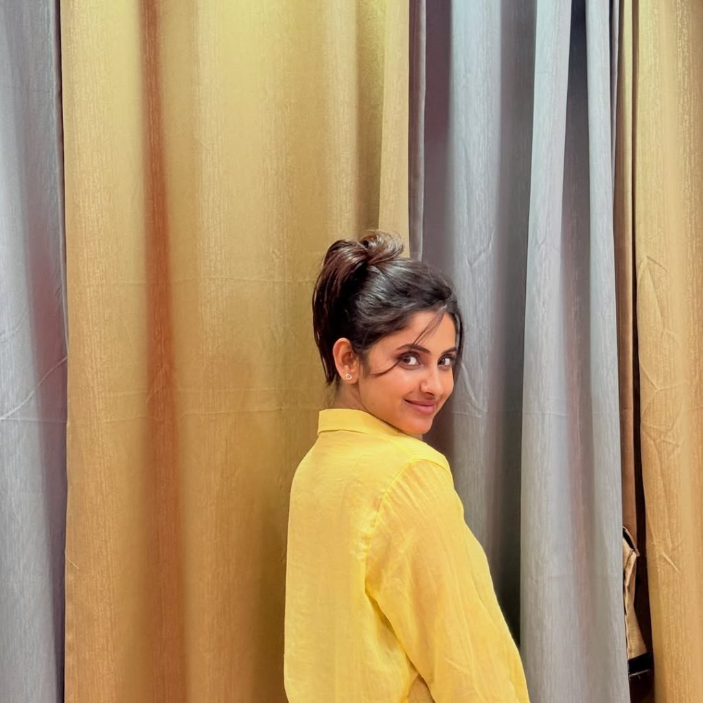 Casual denim styling creates relaxed, approachable fashion statement for Aysha