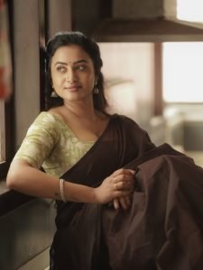 Janani Ashok Kumar embodies natural elegance in brown saree with olive green blouse