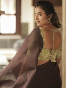 Janani Ashok Kumar embodies natural elegance in brown saree with olive green blouse