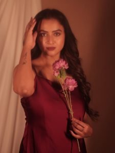 Luxurious satin fabric showcases Janani Ashok Kumar's contemporary fashion sense