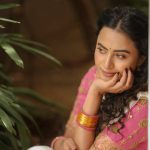 Pink embroidered blouse adds beautiful accent to Janani Ashok Kumar's Kerala saree