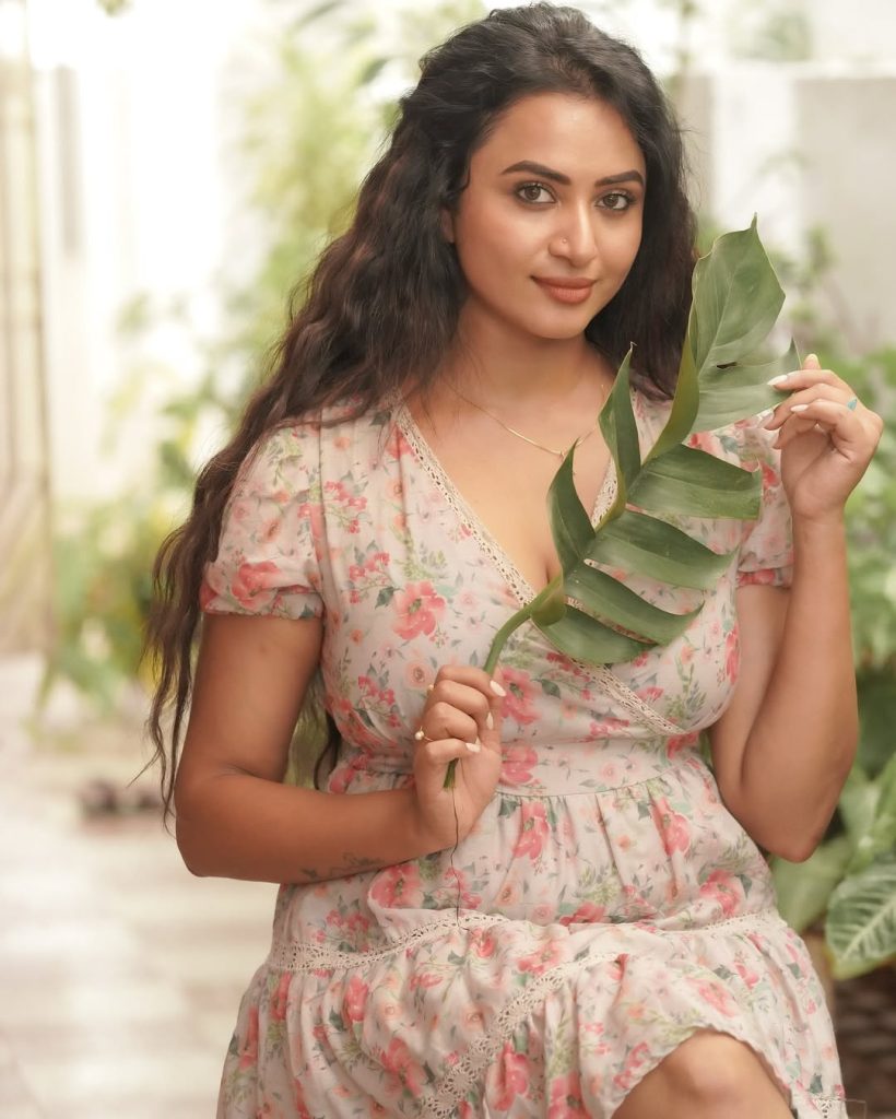 Janani Ashok Kumar embodies relaxed elegance in light pink floral mini dress