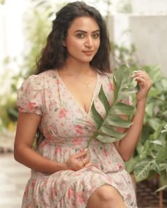 Janani Ashok Kumar embodies relaxed elegance in light pink floral mini dress