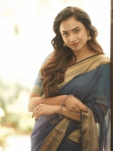 Janani Ashok Kumar embodies sophistication in saree with beautiful curled hair