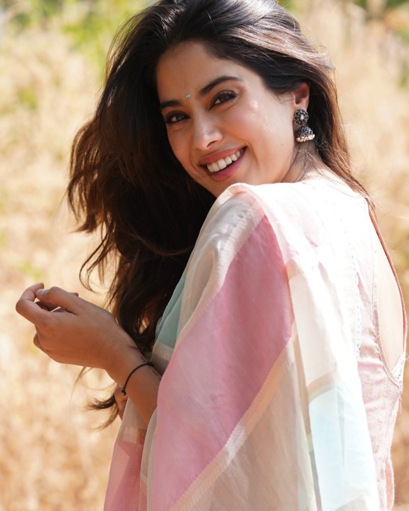 Soft pink saree styling emphasizes Janhvi's youthful charm and grace
