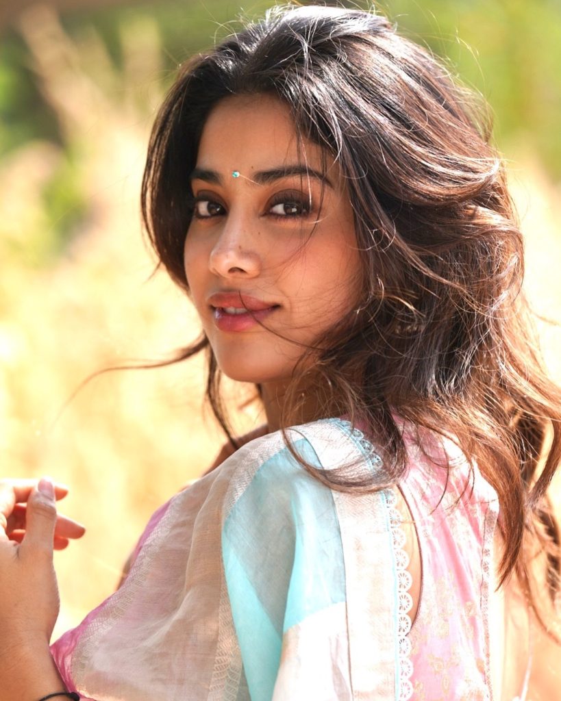 Soft pink saree styling emphasizes Janhvi's youthful charm and grace