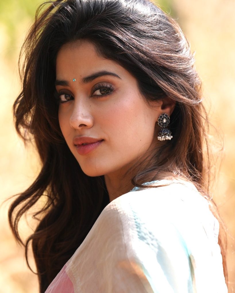 Soft pink saree styling emphasizes Janhvi's youthful charm and grace