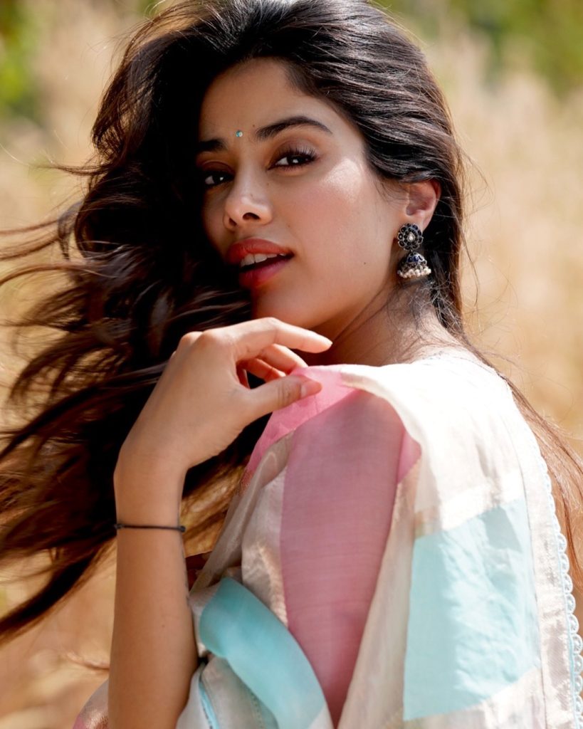 Soft pink saree styling emphasizes Janhvi's youthful charm and grace