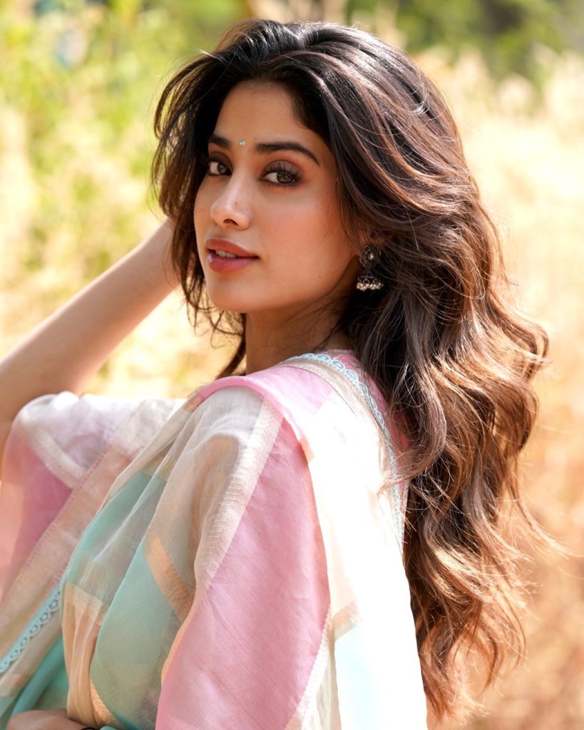 Soft pink saree styling emphasizes Janhvi's youthful charm and grace