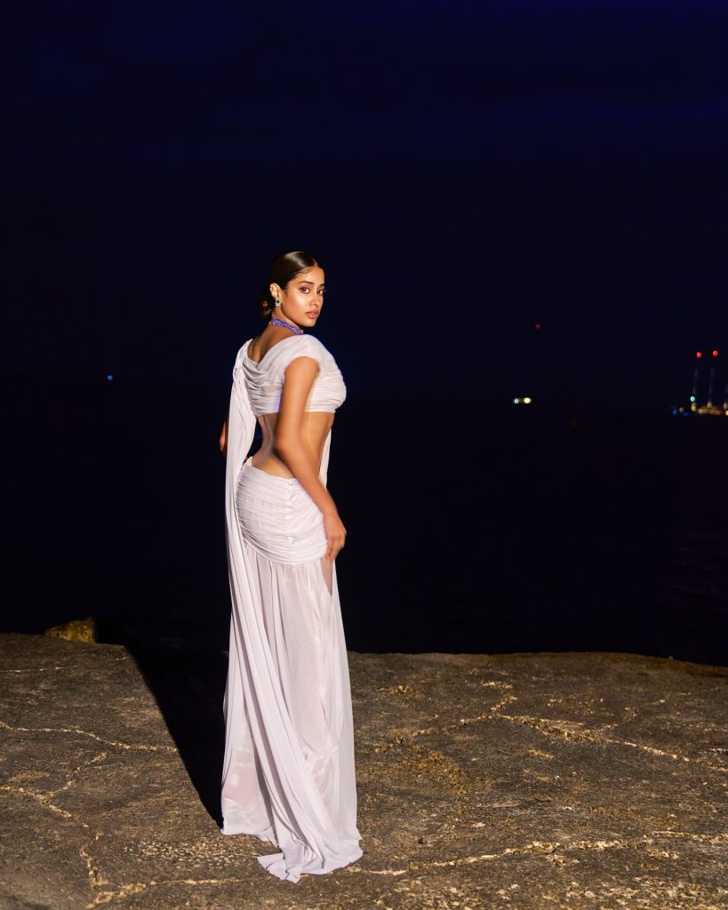 Clean white styling emphasizes Janhvi's natural beauty and charm
