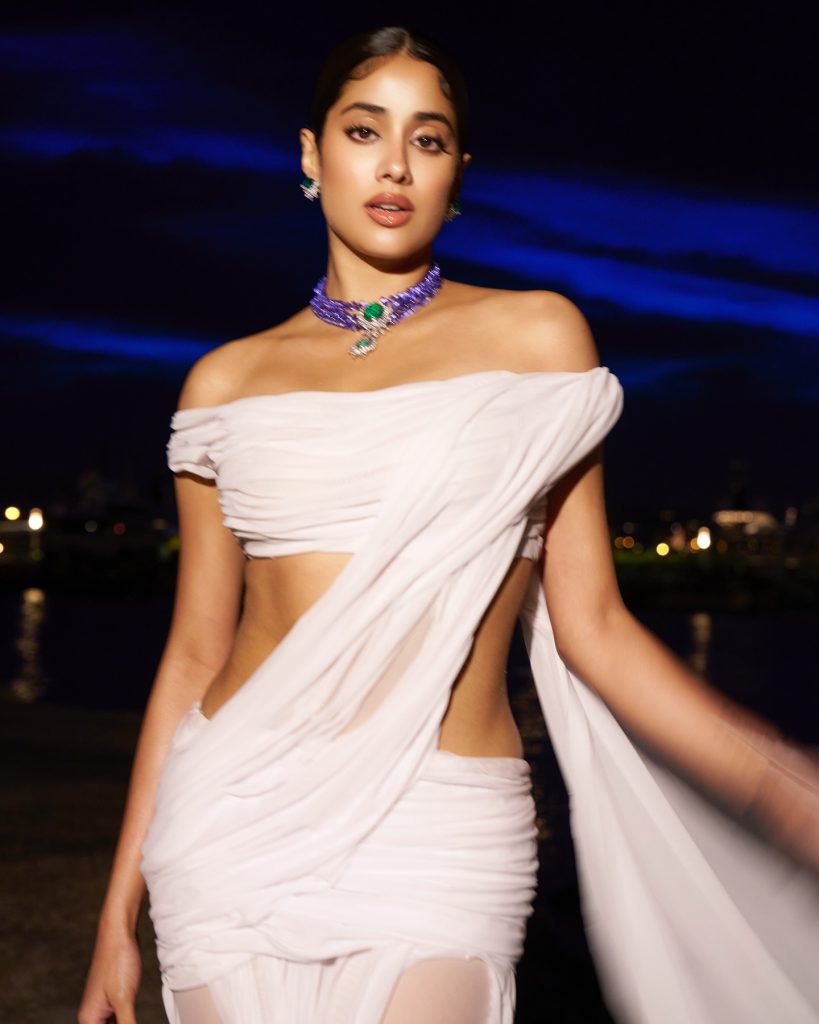 Clean white styling emphasizes Janhvi's natural beauty and charm