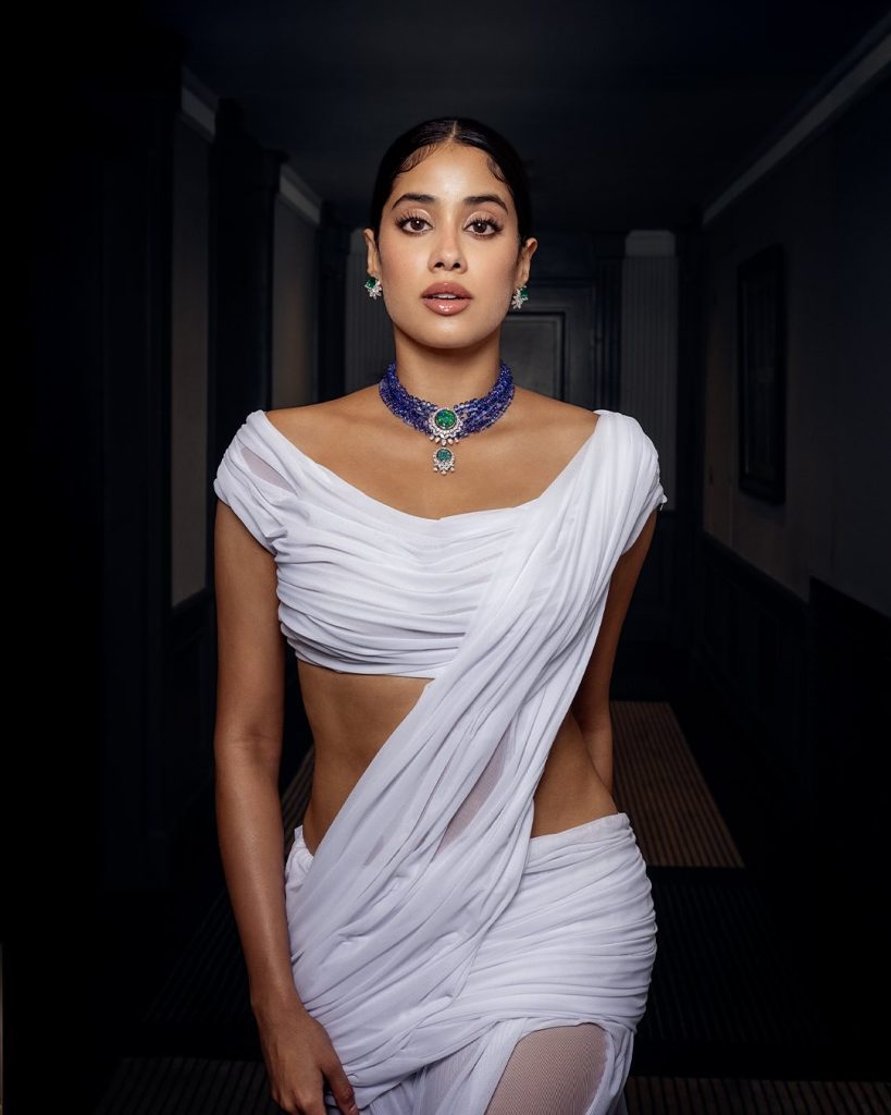 Clean white styling emphasizes Janhvi's natural beauty and charm