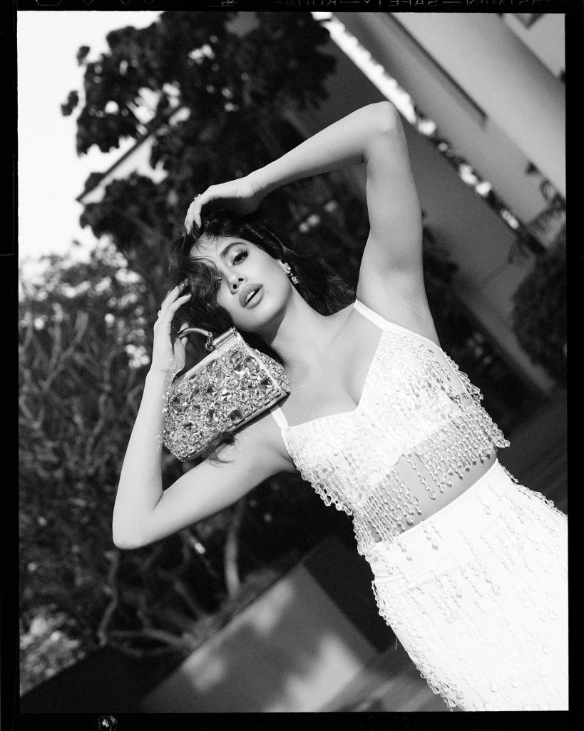 Classic black white styling creates sophisticated visual impact for Janhvi