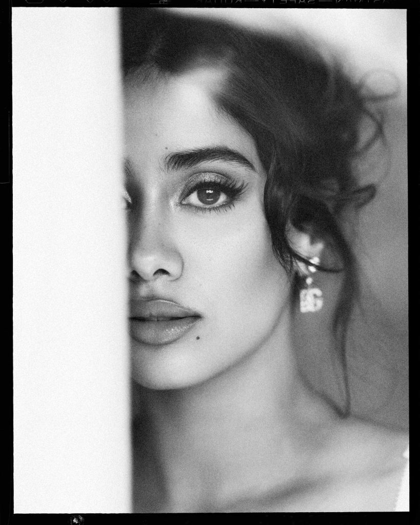 Classic black white styling creates sophisticated visual impact for Janhvi
