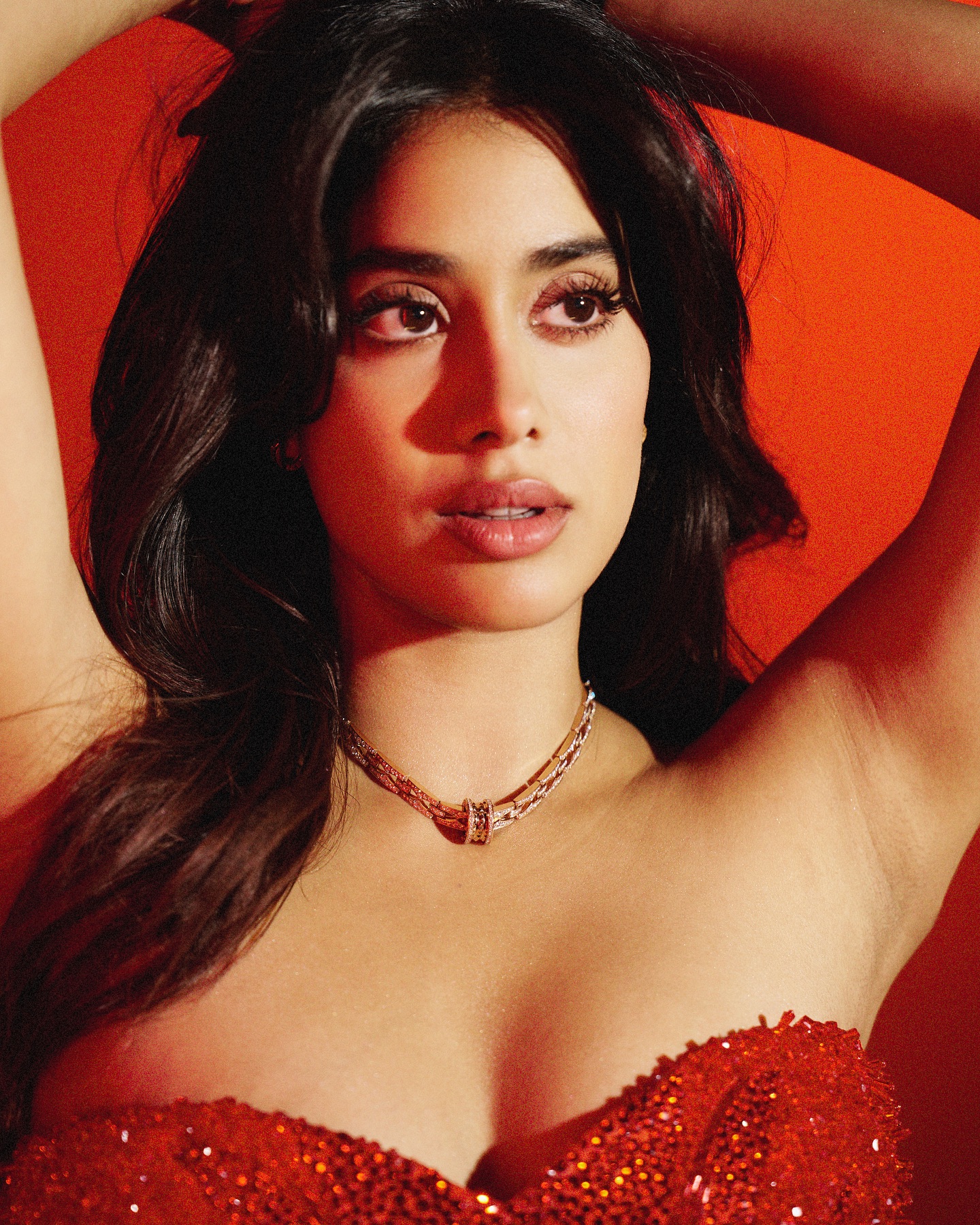 Striking red outfit creates powerful visual impact for Janhvi's photoshoot