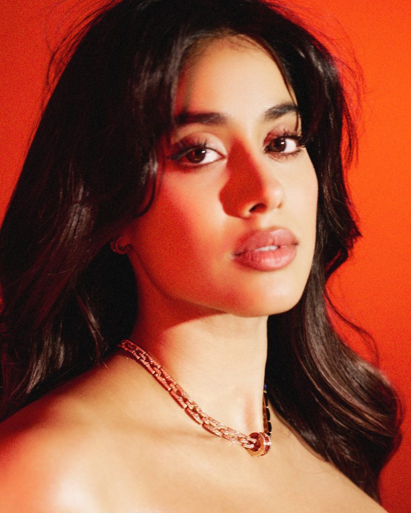 Dramatic red color choice emphasizes Janhvi's screen presence