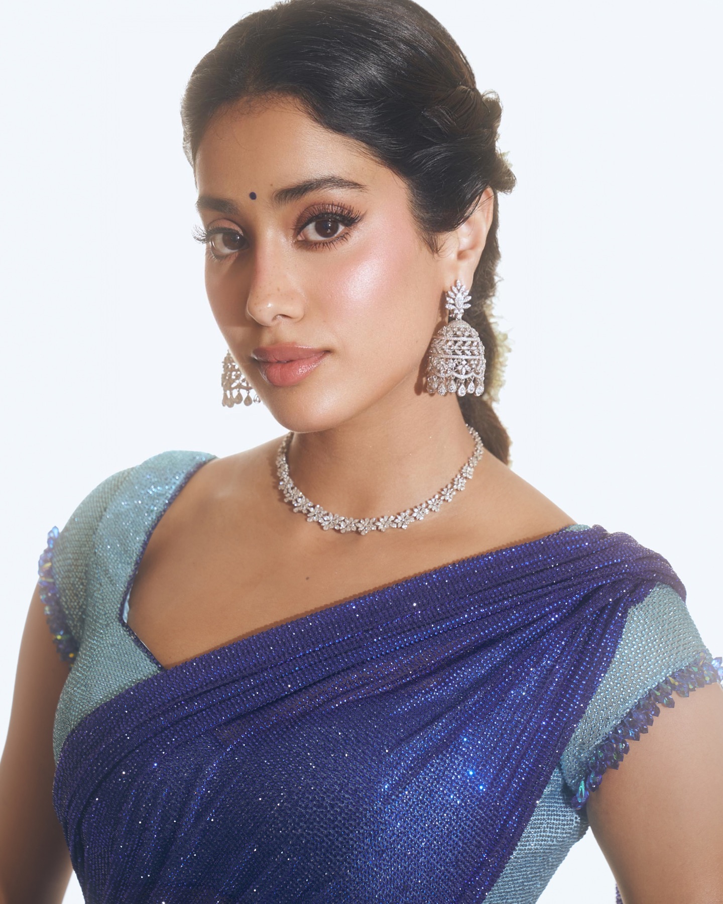 Beautiful blue saree draping showcases Janhvi's traditional fashion expertise