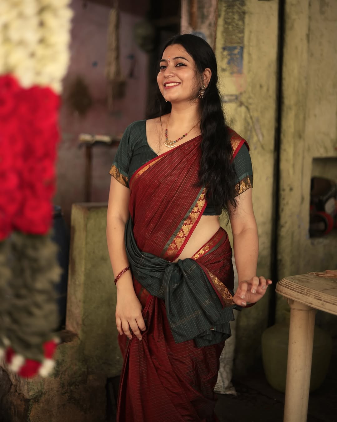 Charming maroon traditional wear reflects Kanduri Sudha's sweet personality