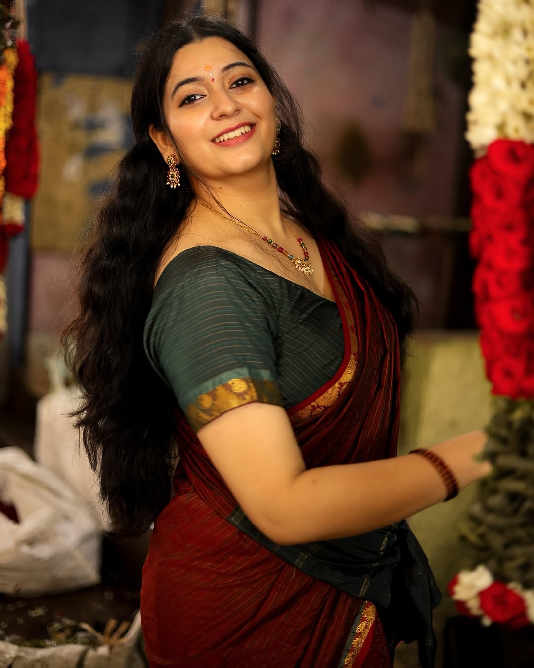Charming maroon traditional wear reflects Kanduri Sudha's sweet personality