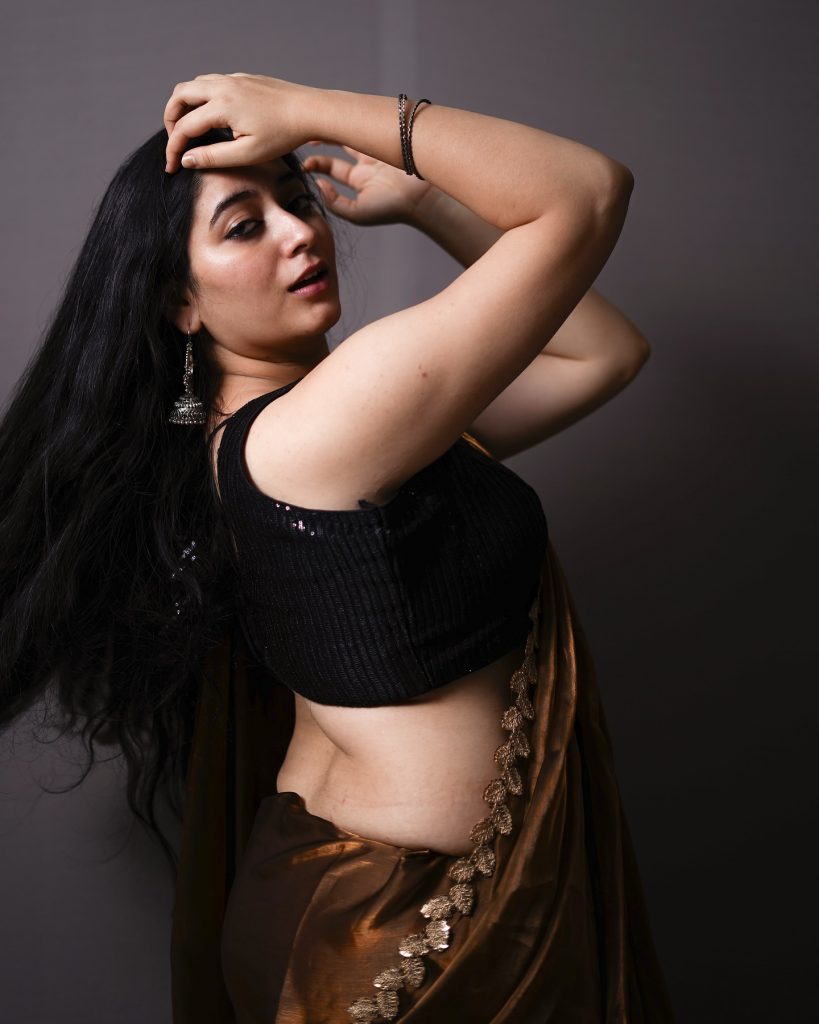 Kanduri Sudha showcases earthy brown traditional wear with golden accessories