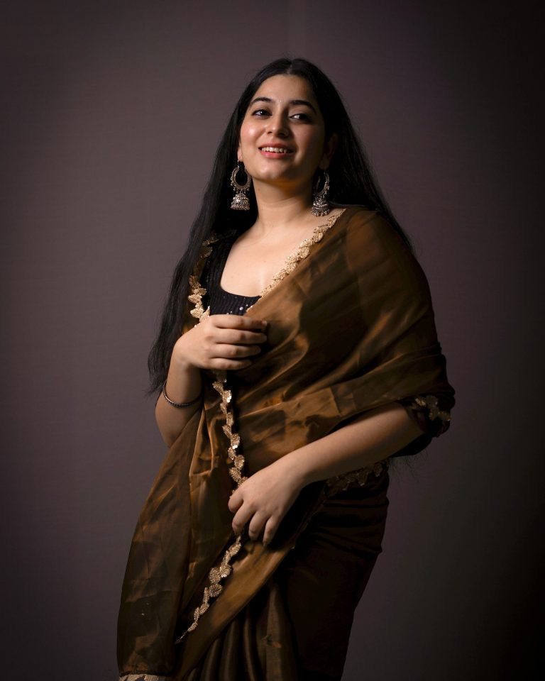 Warm brown tones complement Kanduri Sudha's natural complexion perfectly
