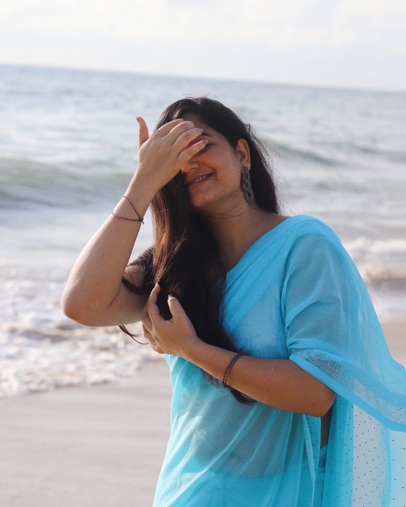 setting enhances the ethereal blue saree worn by Kanduri Sudha
