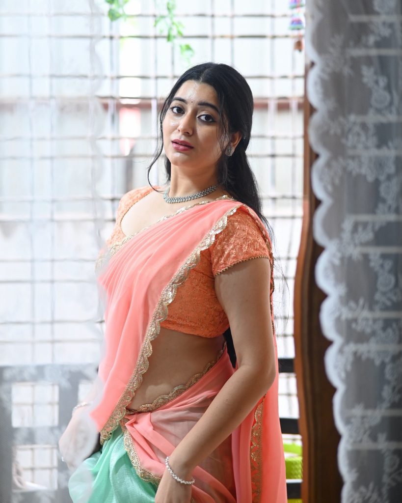 Sudha radiates confidence in rose-colored traditional ensemble