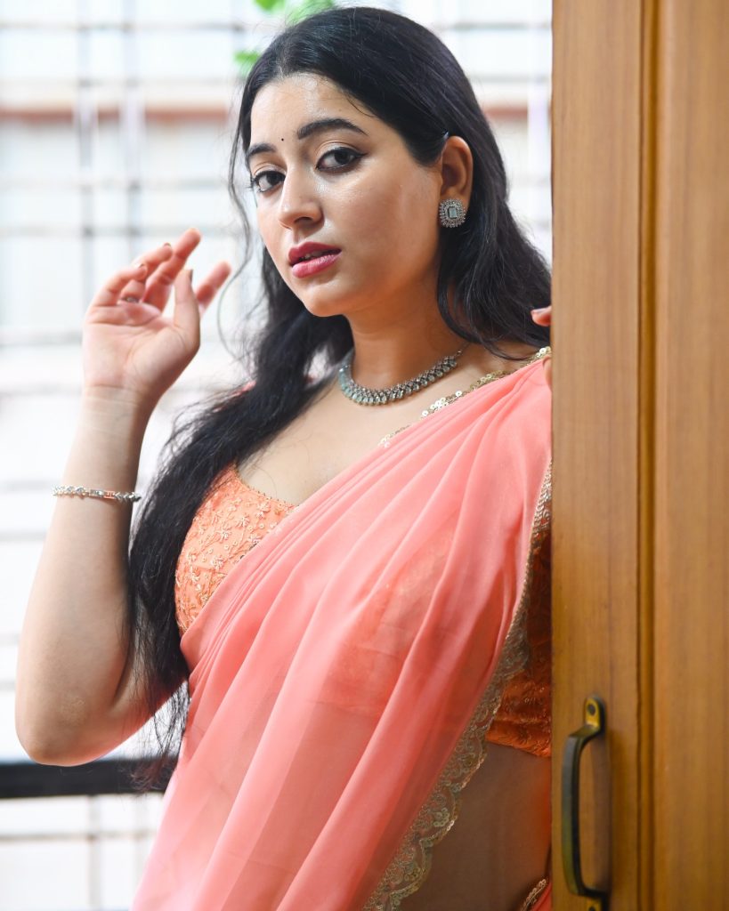 Soft pink hues beautifully captured in Kanduri Sudha's elegant pose