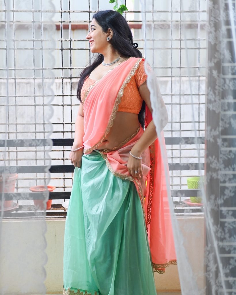Soft pink hues beautifully captured in Kanduri Sudha's elegant pose