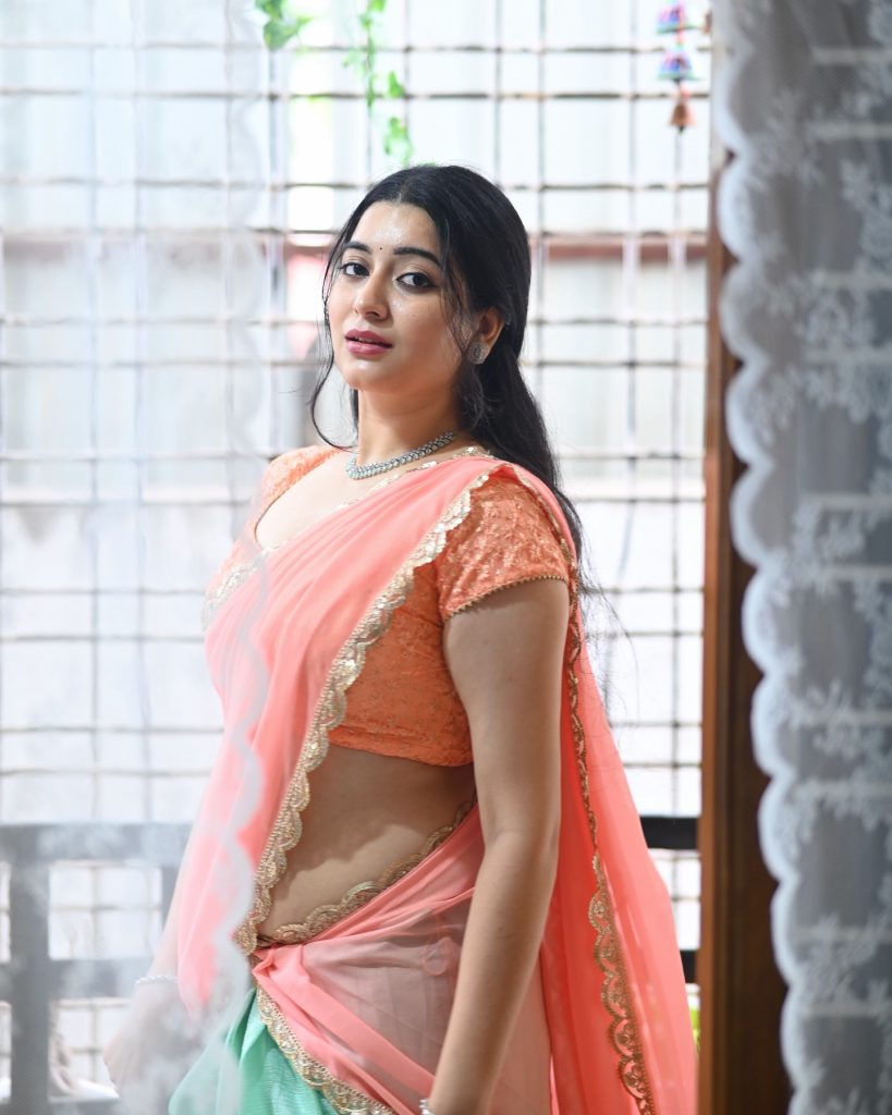 Soft pink hues beautifully captured in Kanduri Sudha's elegant pose