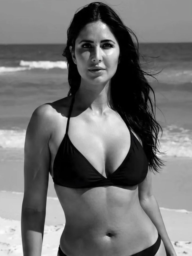 Tropical setting complements Katrina's glamorous beachwear fashion choices