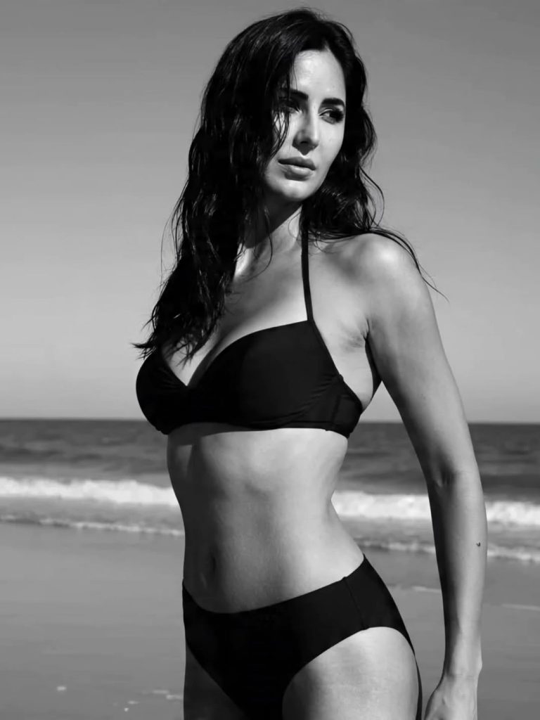 Tropical setting complements Katrina's glamorous beachwear fashion choices