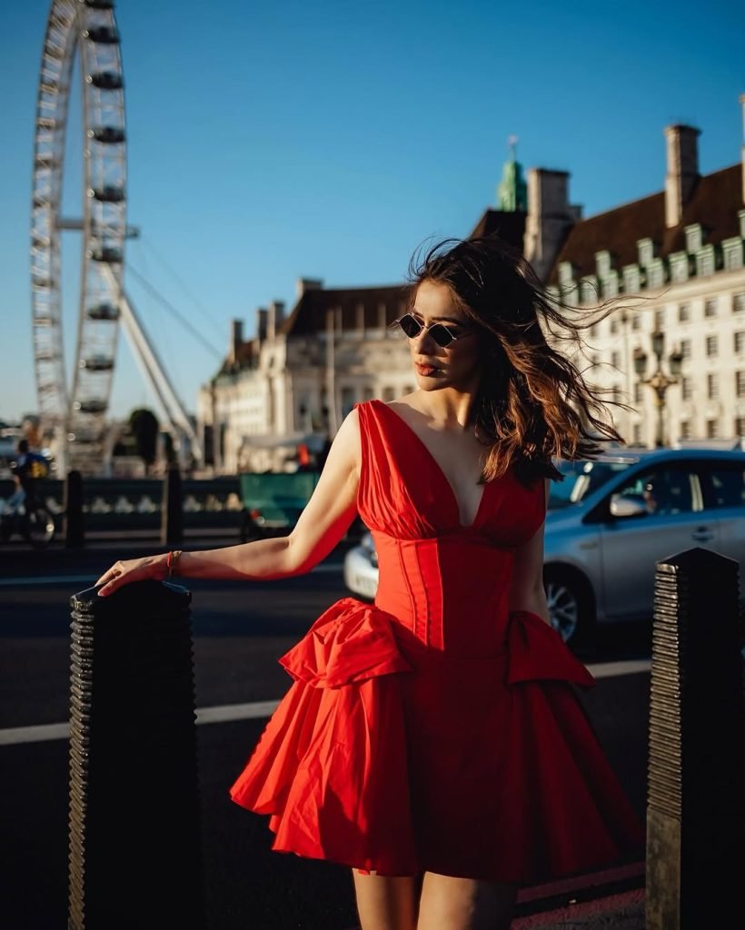Powerful red ensemble creates dramatic impact in Lakshmi's professional photography
