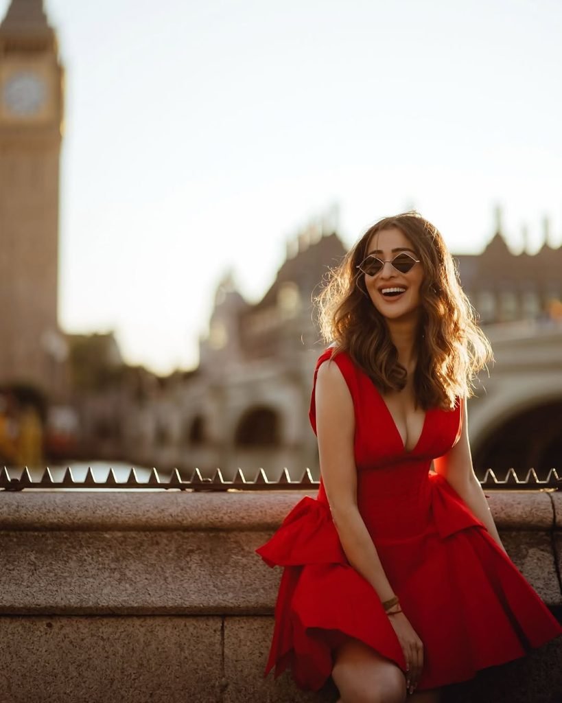 Powerful red ensemble creates dramatic impact in Lakshmi's professional photography