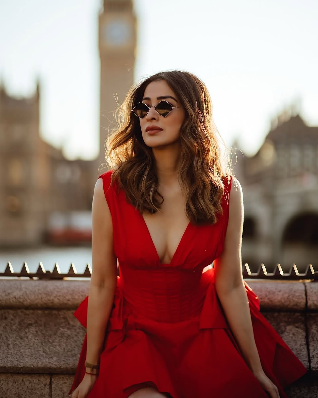 Bold red color choice demonstrates Lakshmi's confident fashion sense