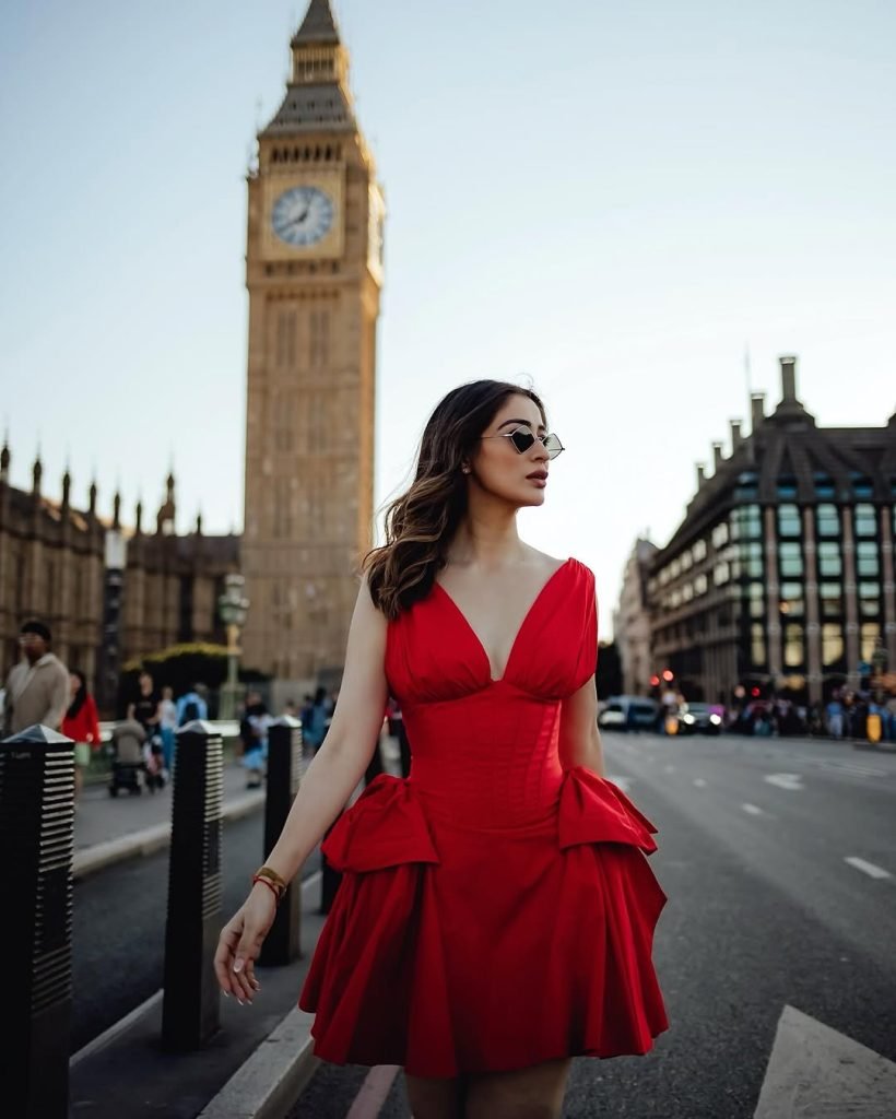 Bold red color choice demonstrates Lakshmi's confident fashion sense