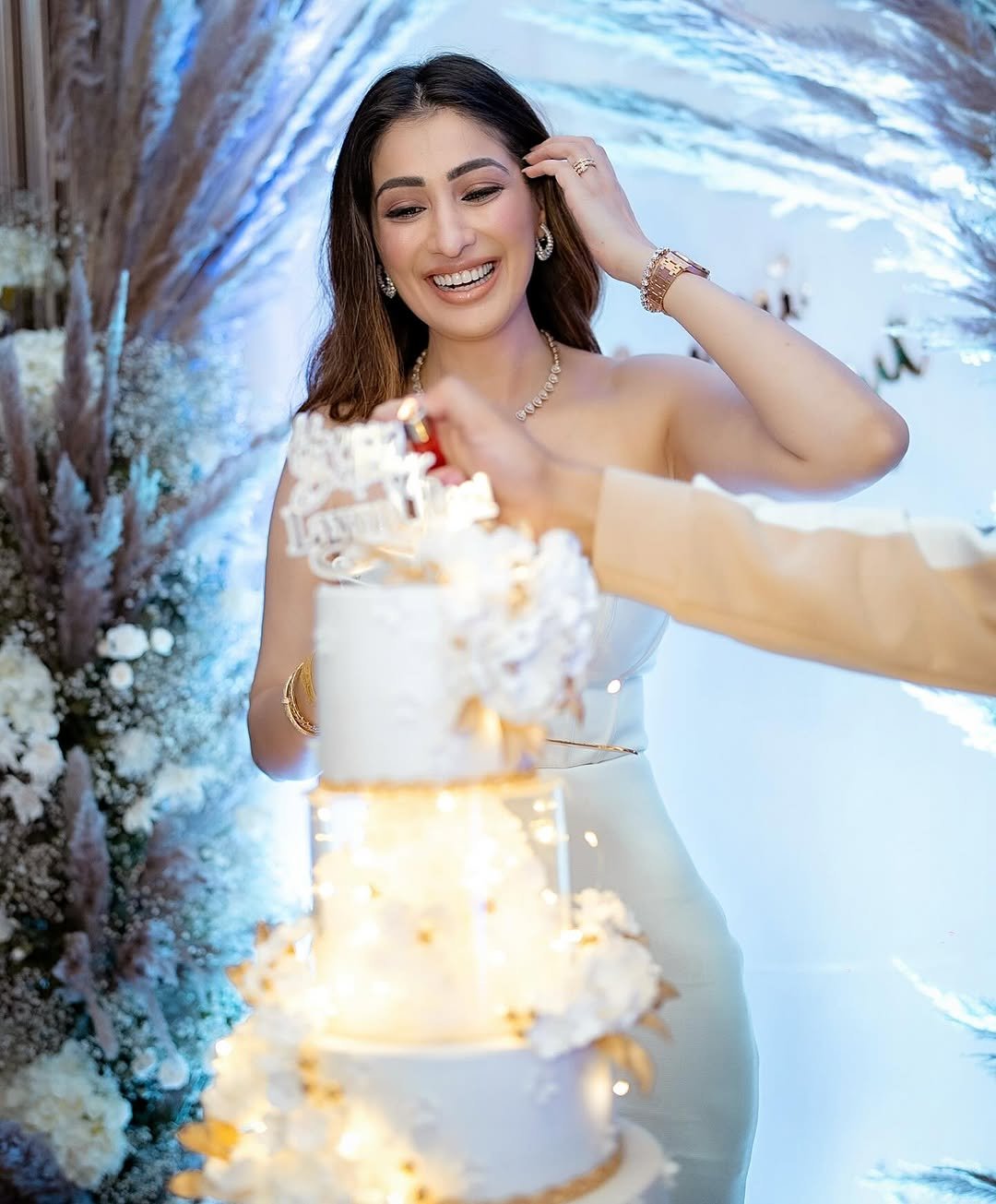 Joyful expression complements Lakshmi's birthday frock's celebratory styling