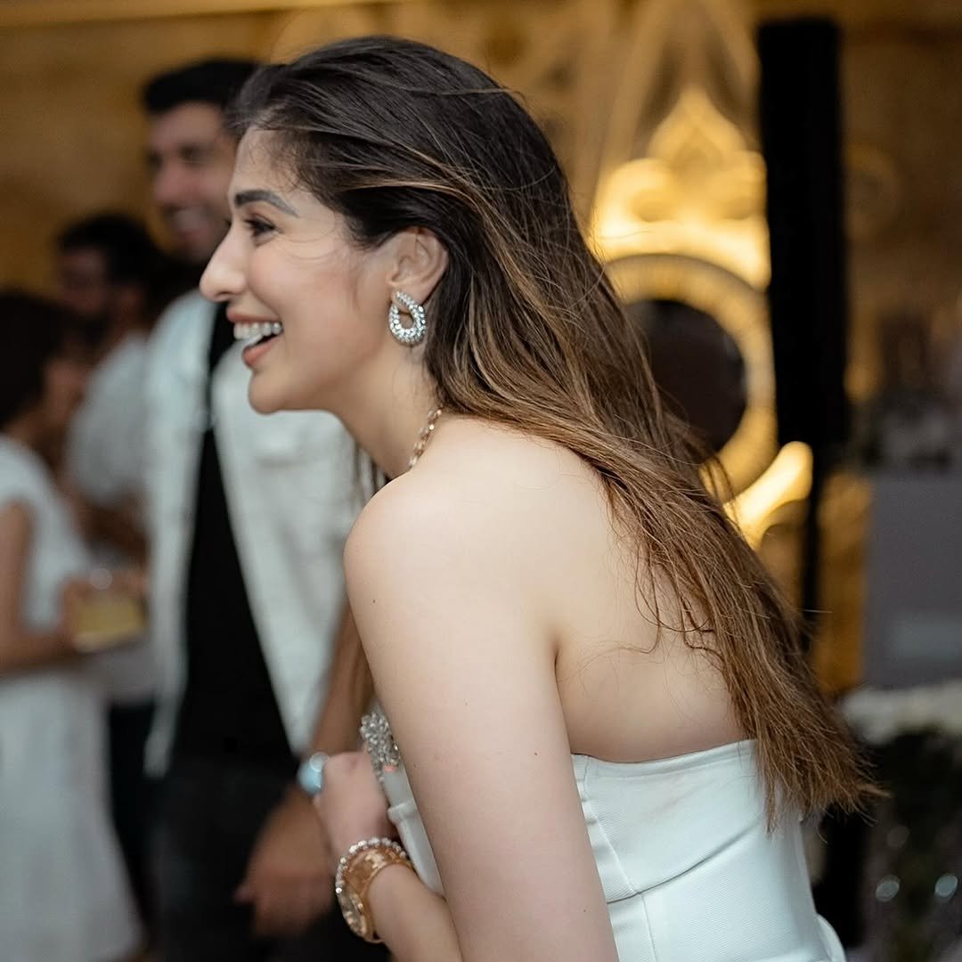 Joyful expression complements Lakshmi's birthday frock's celebratory styling