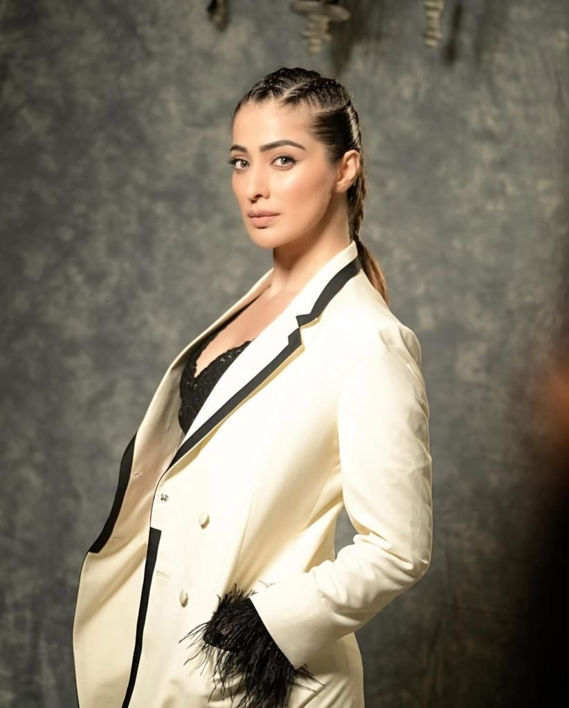 Classic white styling demonstrates Lakshmi's fashion expertise